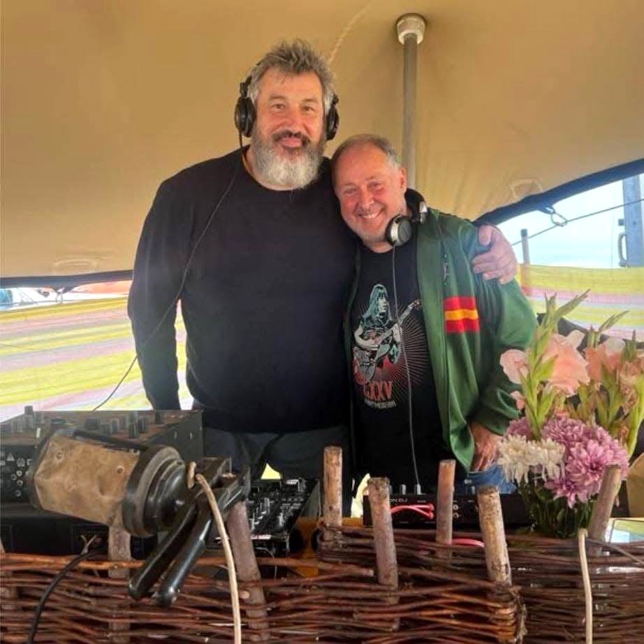 Stevie Bear and DJ Fflyffilyfbybl behind the decks under the Dreamboat canopy